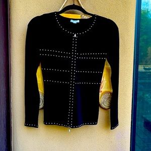 Black stretchy material 3/4 sleeve top with silver grommets